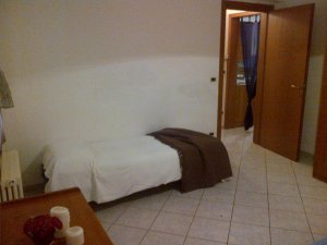 Camera con letto matrimoniale e letto singolo